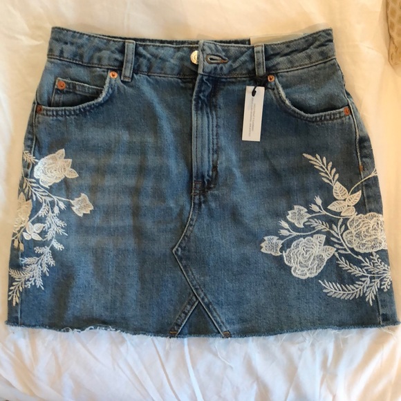 jean skirt with embroidered flowers
